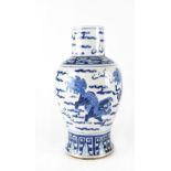 A large Chinese blue and white baluster vase painted with chichi amongst clouds and lotus leaf