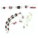Various silver rings, earrings and a bracelet set with pink and red semiprecious stones (11).