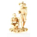 A late 19th century Japanese carved ivory okimono figure group depicting an apple seller holding an