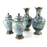 A pair of cloisonné baluster vases with floral decoration,