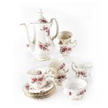 A part Royal Albert 'Lavender Rose' tea service comprising teapot, five cups, six saucers,