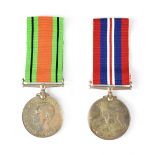 A WWII War Medal and a 1939-45 Defence Medal (2).