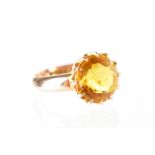 A 9ct gold and citrine ring, size K,