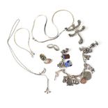 A small quantity of silver jewellery to include a charm bracelet, two slim flat necklaces,