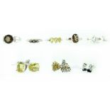 Five silver rings set with brown, yellow and clear coloured stones, semiprecious stones,