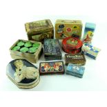 A quantity of vintage tins to include a suitcase biscuit tin for Gray & Dunn,