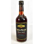 SPIRITS; a single 1970s/80s bottle of Captain Morgan Black Label Jamaica Rum, 26 2/3 fl. ozs., 70