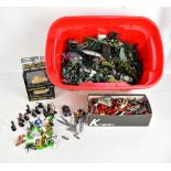 A group of military themed models and figures including Dinky truck, two boxed Corgi Fighting