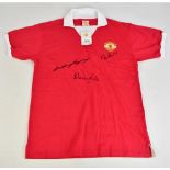 MANCHESTER UNITED; an Official Retro Revival 1972-style cotton home shirt, signed by club top