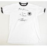 GERMANY; a retro-style T-shirt with printed German National Team logo, signed by Franz