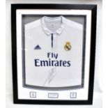 GARETH BALE; a signed Real Madrid Adidas 2016-17 home shirt, framed and glazed, frame 79 x 64cm.