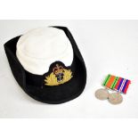 A Women's Royal Naval Service Wren's hat with bullion work crowned fouled anchor device and a WWII
