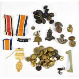 A small group of original cap badges including Northumberland Fusiliers and Royal Welsh Fusiliers,