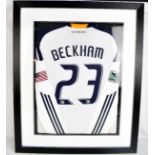 DAVID BECKHAM; a match-worn LA Galaxy long sleeved home shirt, set in contemporary frame, 19 x 73.