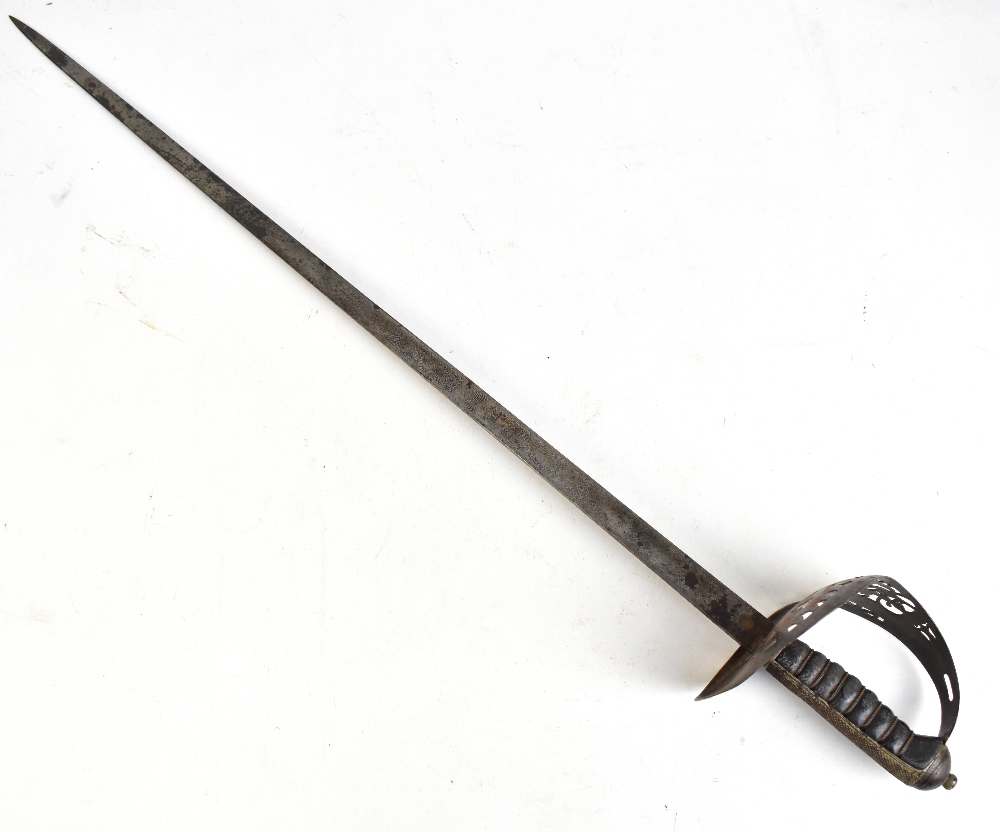 A George V officer's dress sword with pierced guard, wire-work shagreen grip and engraved blade by