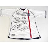 ENGLAND WORLD CUP WINNERS; an England 2001 Umbro home shirt, signed by Hurst, Peters, Jackie and