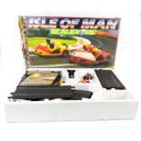 SCALEXTRIC; two boxed 'Isle of Man' and 'Pole Position' sets, both with two vehicles and controllers