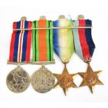 A WWII medal group of four comprising War and Defence Medals, Atlantic and 1939-1945 Stars,