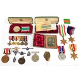 A WWII medal group of five comprising War (with Oak Leaf) and Defence Medals, 1939-1945, Italy and