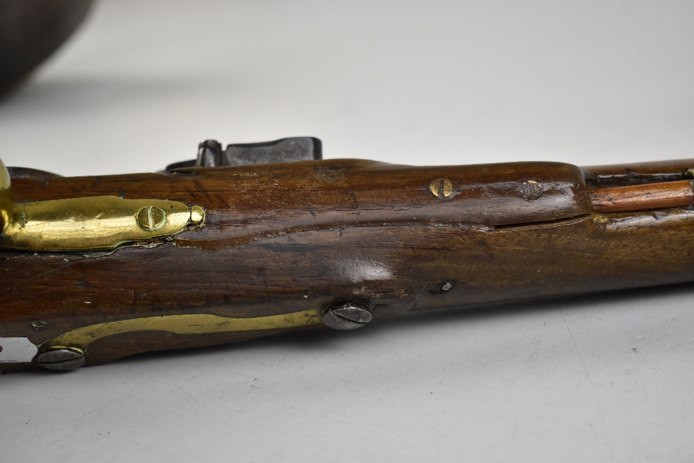 An early 19th century walnut stocked flintlock pistol, the lock plate stamped 'Tower, GR' beneath - Image 5 of 5