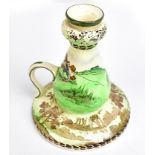 SHELLEY; a rare golf themed chamberstick with transfer printed and coloured decoration featuring