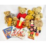 A group of assorted teddy bears and Disney related toys including models of Mickey and Minnie Mouse,