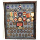 A collection of miniature rifle club medals including silver examples, approximately twenty-five,