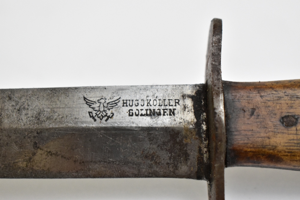 A German WWI trench fighting knife, the blade signed 'Hugo Koller Solingen' with eagle logo, to part - Image 2 of 3