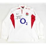 JONNY WILKINSON; a signed England Rugby Nike home shirt, with inscription, size M.