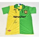 ERIC CANTONA; a signed Manchester United Umbro 1992-94 third kit shirt in Newton Heath colours, no