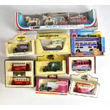 Over sixty boxed model cars and vehicles, predominantly Lledo and Corgi, with further Oxford and