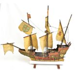 An early to mid-20th century scratch built model three-mast galleon with painted detail (for