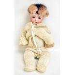 HEUBACH & KOPPELSDORF; an early 20th century German bisque head doll with blond wig (cut and