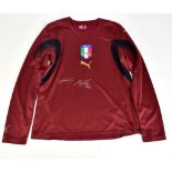 GIANLUIGI BUFFON; a signed Italy Puma long sleeved maroon goalkeeper's shirt, size child M.