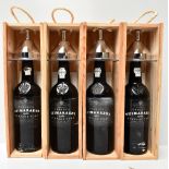 PORT; four bottles of Fonseca Guimaraens 1986, with funnels in presentation cases (4).