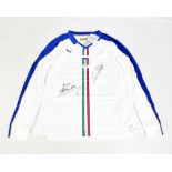 ITALY; a Puma away shirt signed by Fabio Cannavaro and Andrea Pirlo, stated size 16.