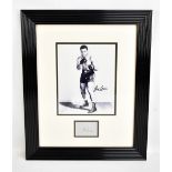 JOE LOUIS; an autographed montage depicting a photograph of Louis and a cut signature below, 44 x