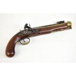 HAIGHAM; a walnut stocked and brass mounted flintlock pistol with folding bayonet, length 36cm.