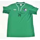 NEW YORK COSMOS; an Umbro cotton replica shirt in green with embroidered badge, signed by Franz