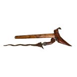 A Javanese kris with carved wooden handle and sheath, length 45cm (af).
