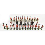 BRITAINS; a group of painted lead model soldiers comprising cavalry officers and infantry
