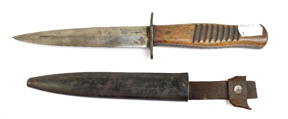 A German WWI trench fighting knife, the blade signed 'Hugo Koller Solingen' with eagle logo, to part