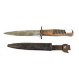 A German WWI trench fighting knife, the blade signed 'Hugo Koller Solingen' with eagle logo, to part