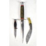 A hunting knife with painted steel hilt, length 25.5cm, and two smaller associated knives, in