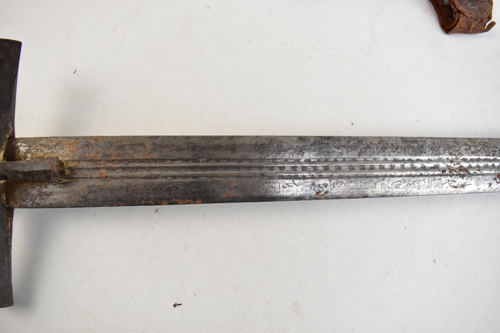 A Sudanese kaskara, the fullered blade with engraved Arabic script to both sides, length of blade - Image 2 of 6