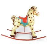 A mid-20th century tin rocking horse with coloured detail, 78 x 102cm.Additional InformationChips