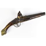 A late 18th/early 19th century Eastern walnut stocked and brass mounted flintlock pistol, length