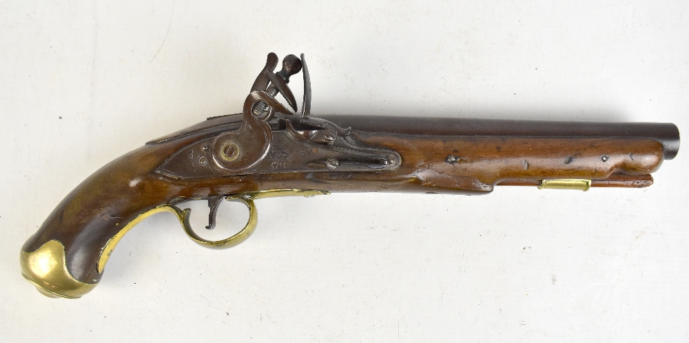 An early 19th century walnut stocked flintlock pistol, the lock plate stamped 'Tower, GR' beneath