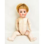 HEUBACH & KOPPELSDORF; an early 20th German bisque headed doll with blonde wig (cut) open/closed