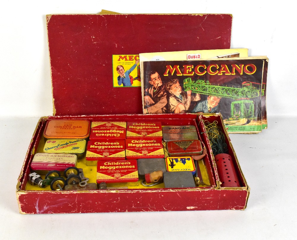 MECCANO; a boxed Outfit No.7 with instruction booklets for Outfits 6, 7 and 8, upper tray components